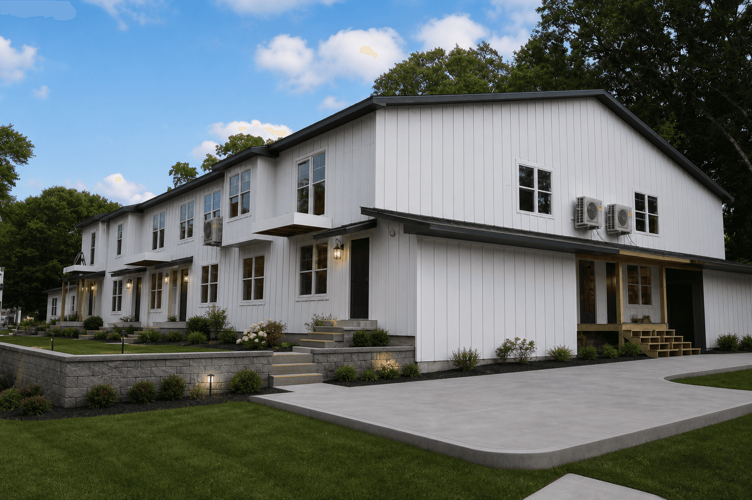 Two-story Tillson Woods residence with a landscaped walkway and lawn.