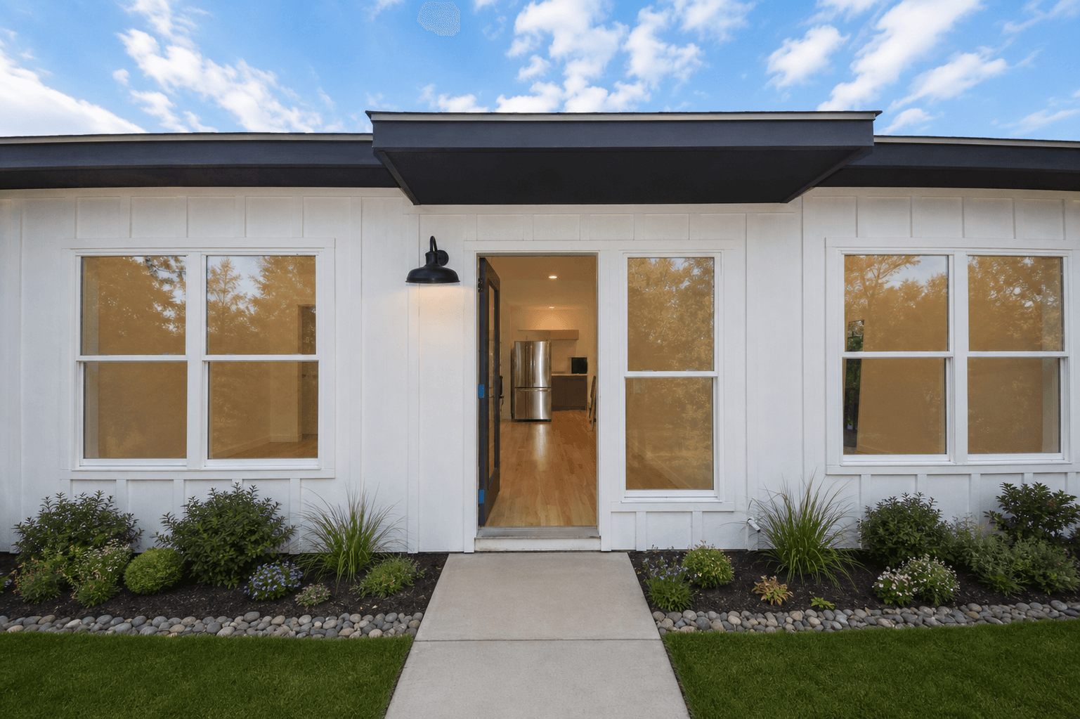 Private Tillson Woods residence entrance with a landscaped front walk.
